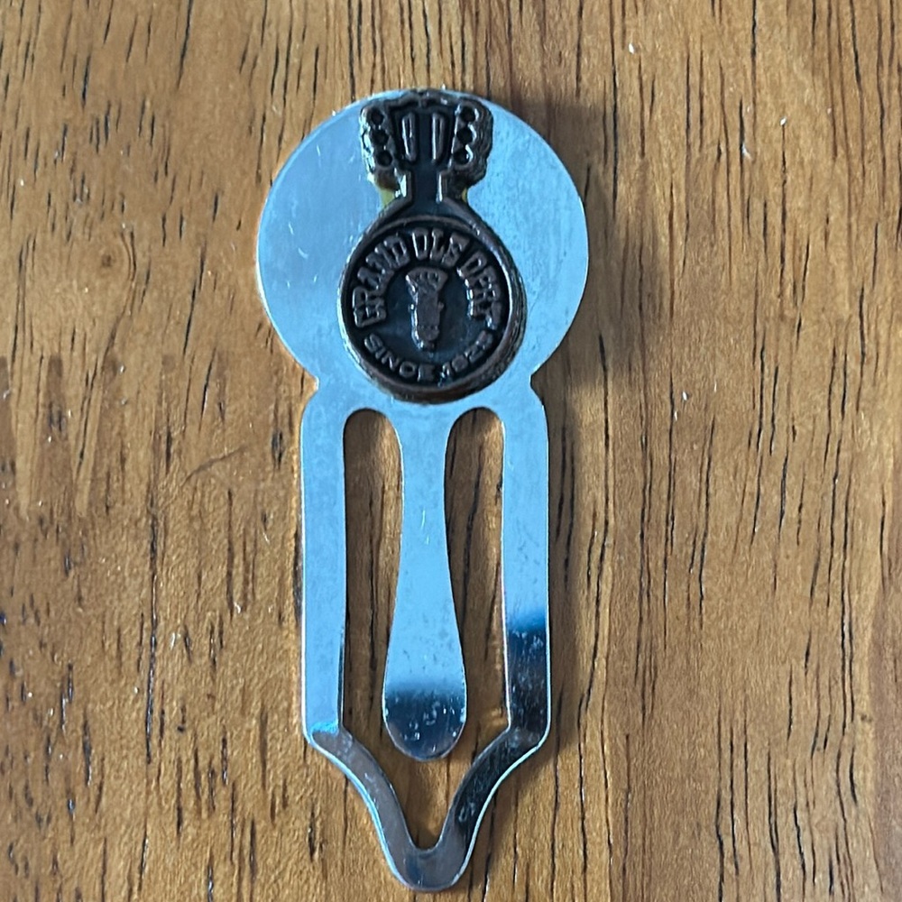 Grand Ole Opry music sheet holder. Size of a large paperclip. Silver & copper